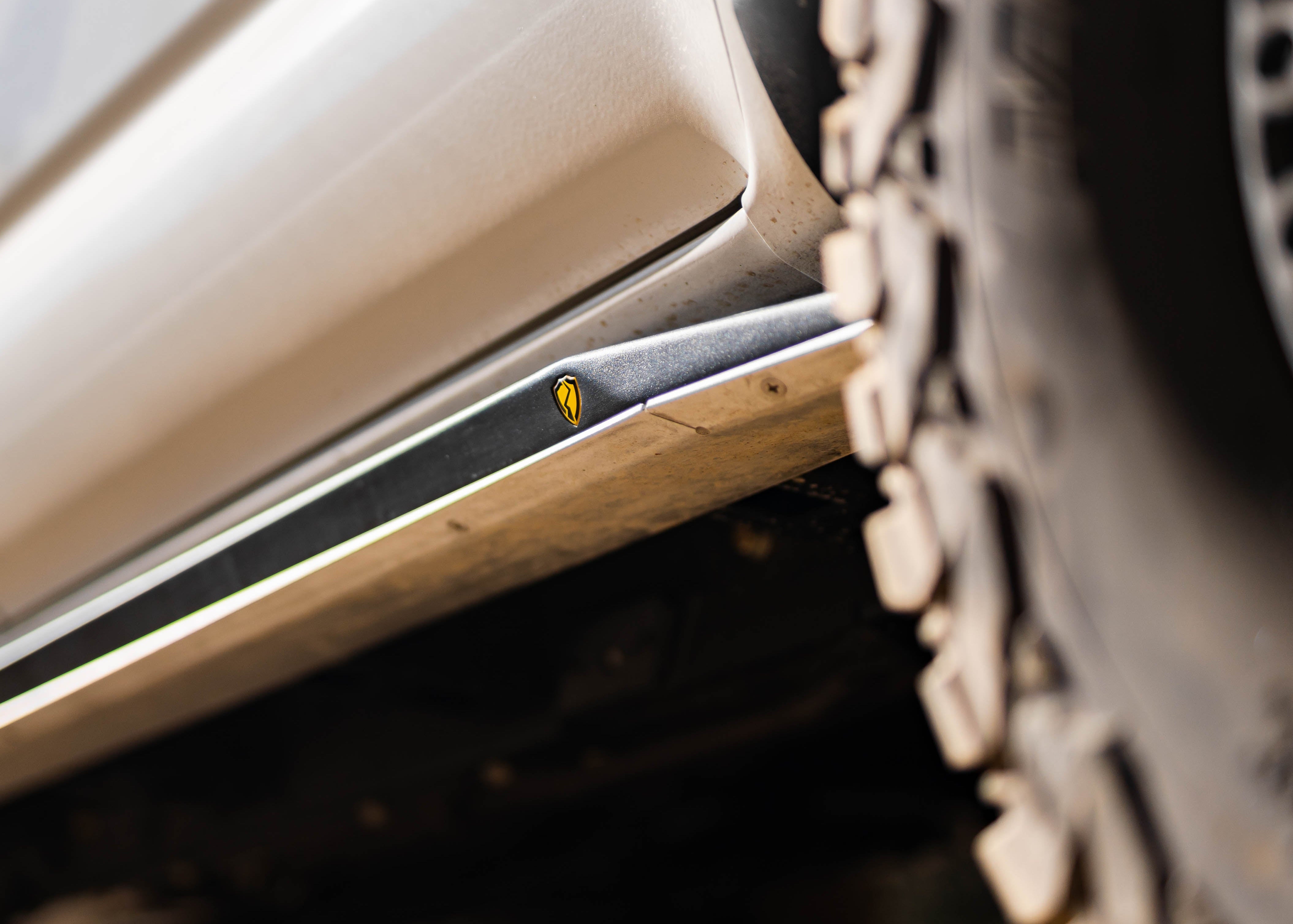 Toyota Tacoma rock sliders with integrated flat step