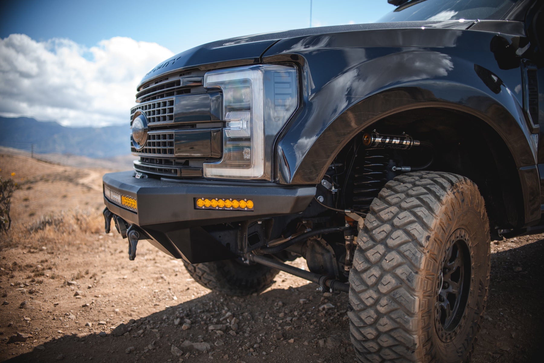 Close-up of Saints Offroad front bumper installed on a Ford F-250 Super Duty