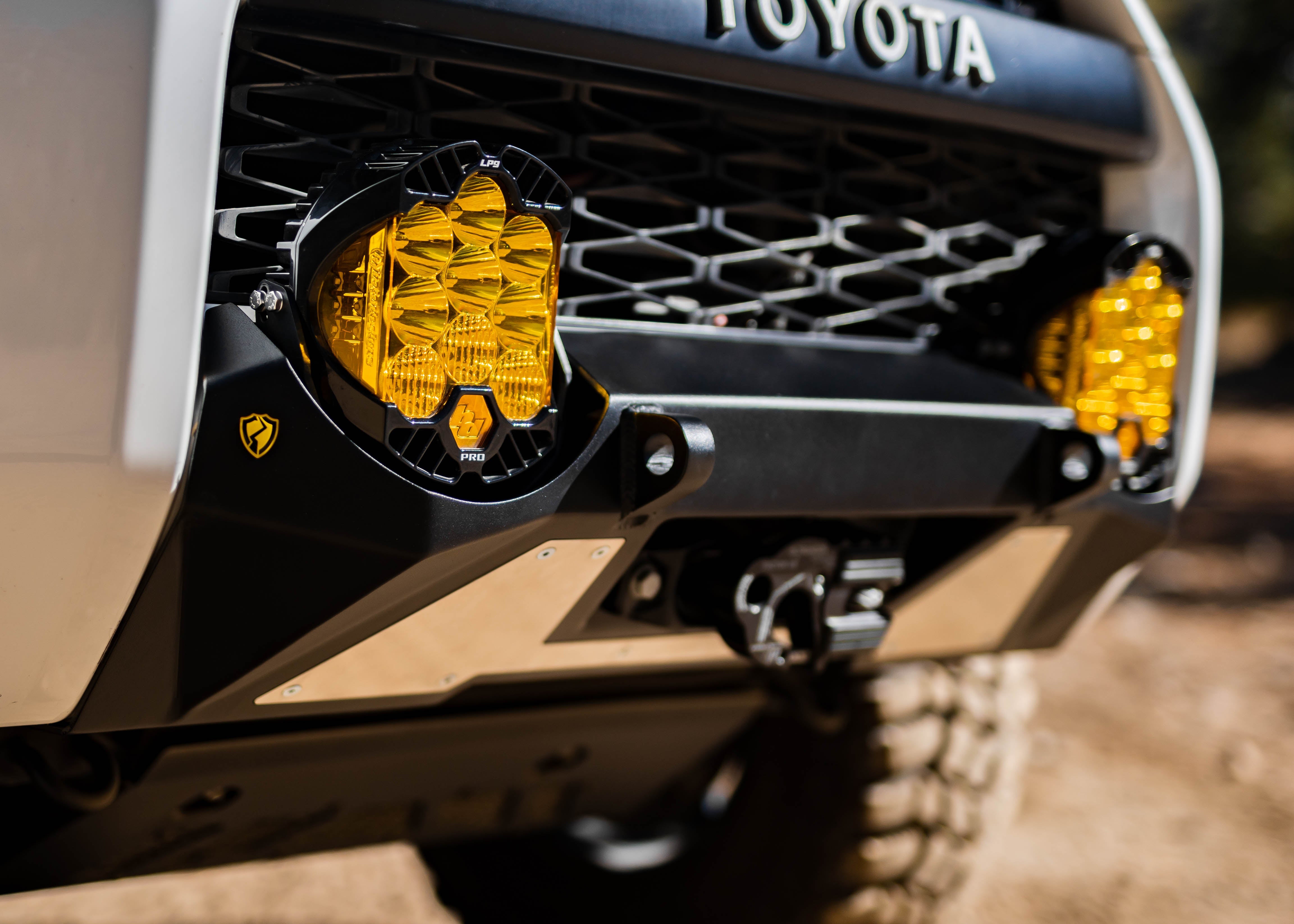 Close-up of Saints Offroad Toyota 4Runner front bumper and aluminum filler plate