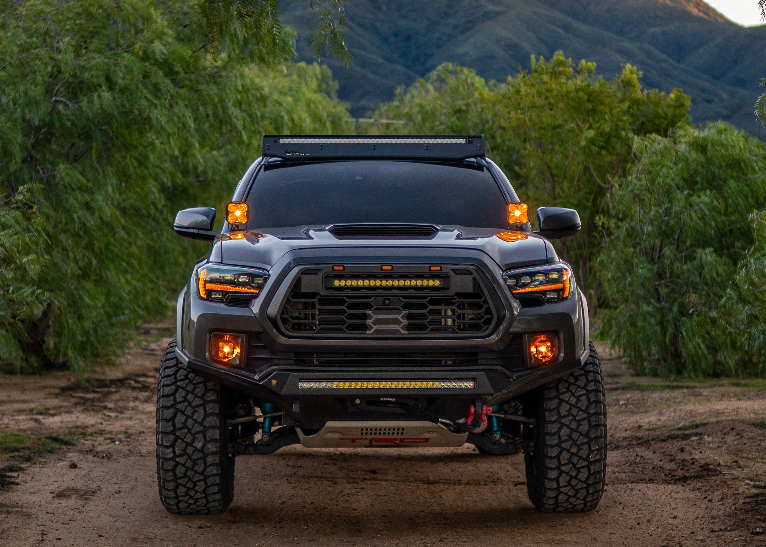 Toyota Tacoma Alpha Front Bumper on an off-road trail